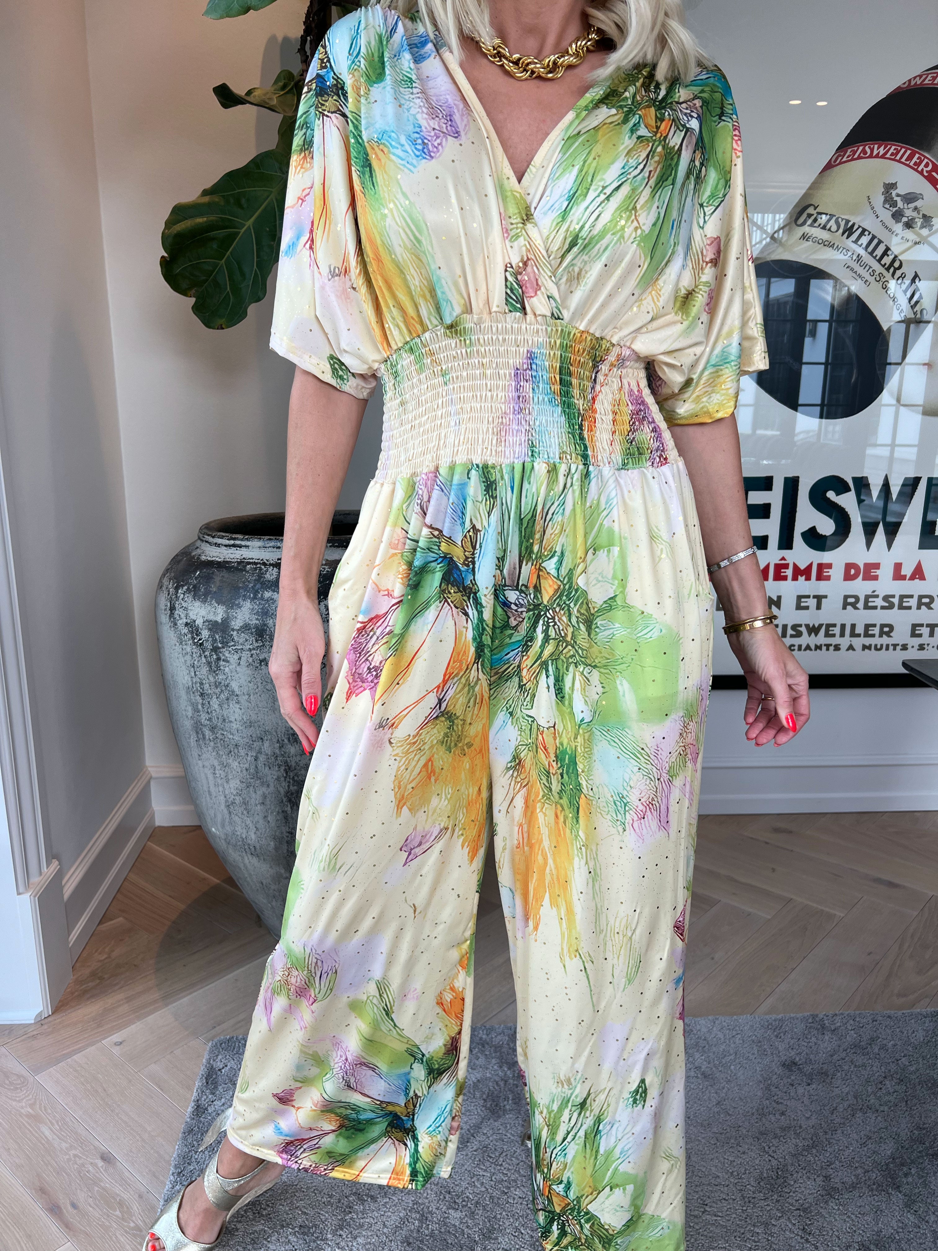 Pams Print Jumpsuit - Stretchig mönstrad jumpsuit med guldfärgat damm